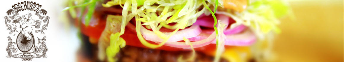 Eating American (Traditional) Burger Sandwich Salad at Bareburger restaurant in Montclair, NJ.